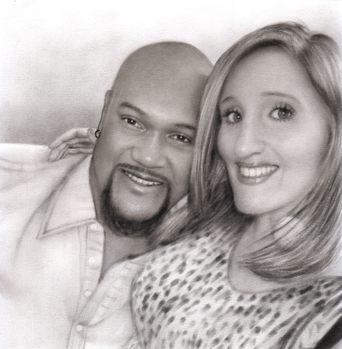 A black and white charcoal drawing of a man and woman, perfect for an anniversary gift.