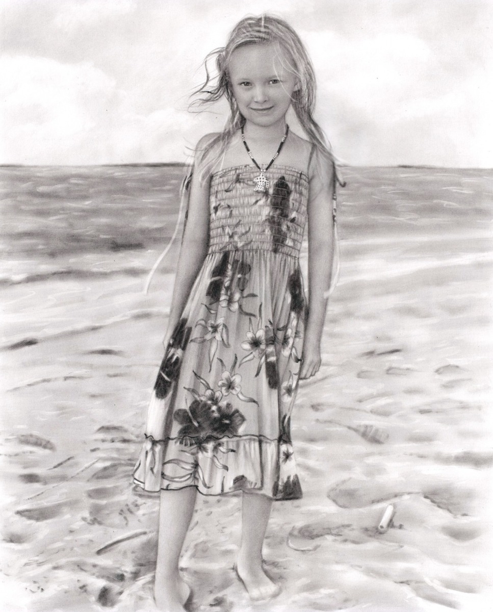 A commissioned black and white drawing capturing the innocence of childhood on the beach.