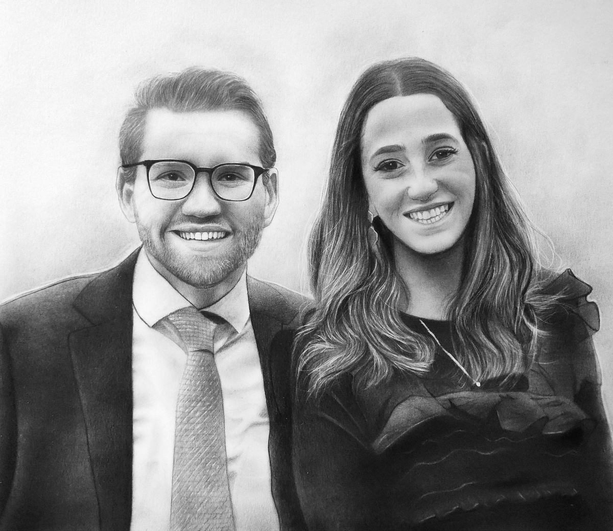 A custom black and white couple portrait drawing.