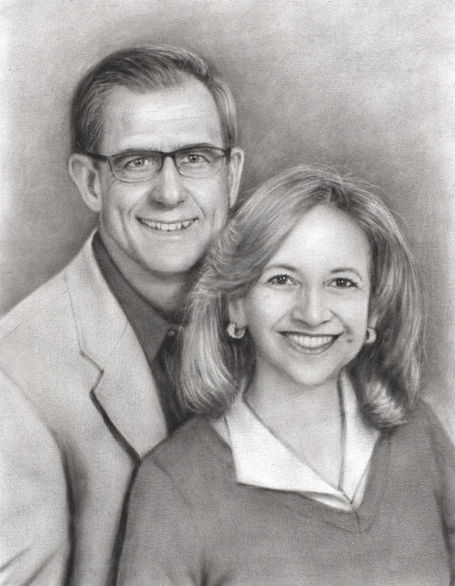 A premium charcoal drawing of a man and woman.