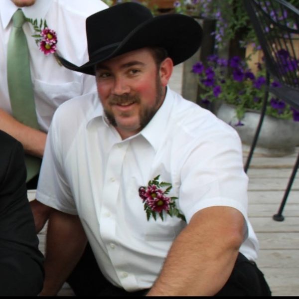 A man wearing a cowboy hat.