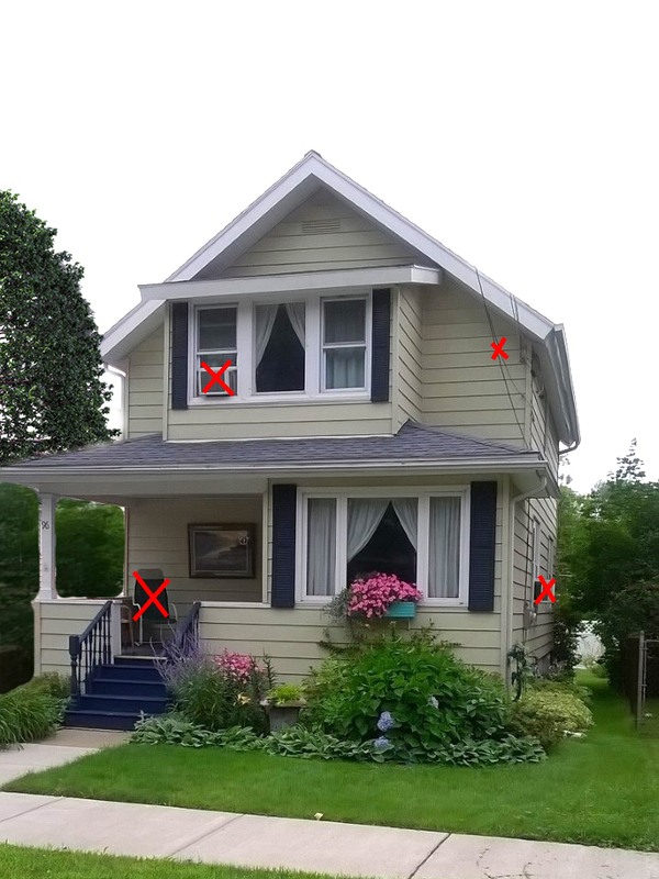 A house with red arrows pointing to different parts of the house.