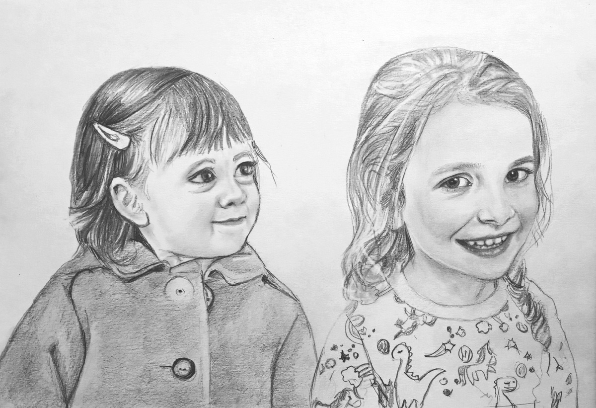 A pencil drawing of two little girls smiling, perfect for a father's day gift.
