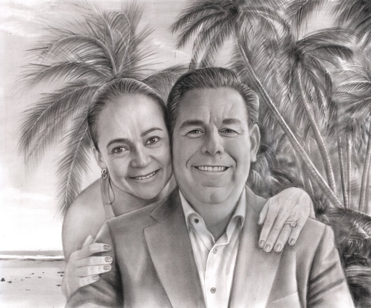A black and white charcoal drawing of a man and woman on the beach, perfect for anniversary painting ideas for husband.