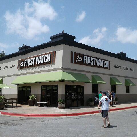 A restaurant with a sign that says first watch.