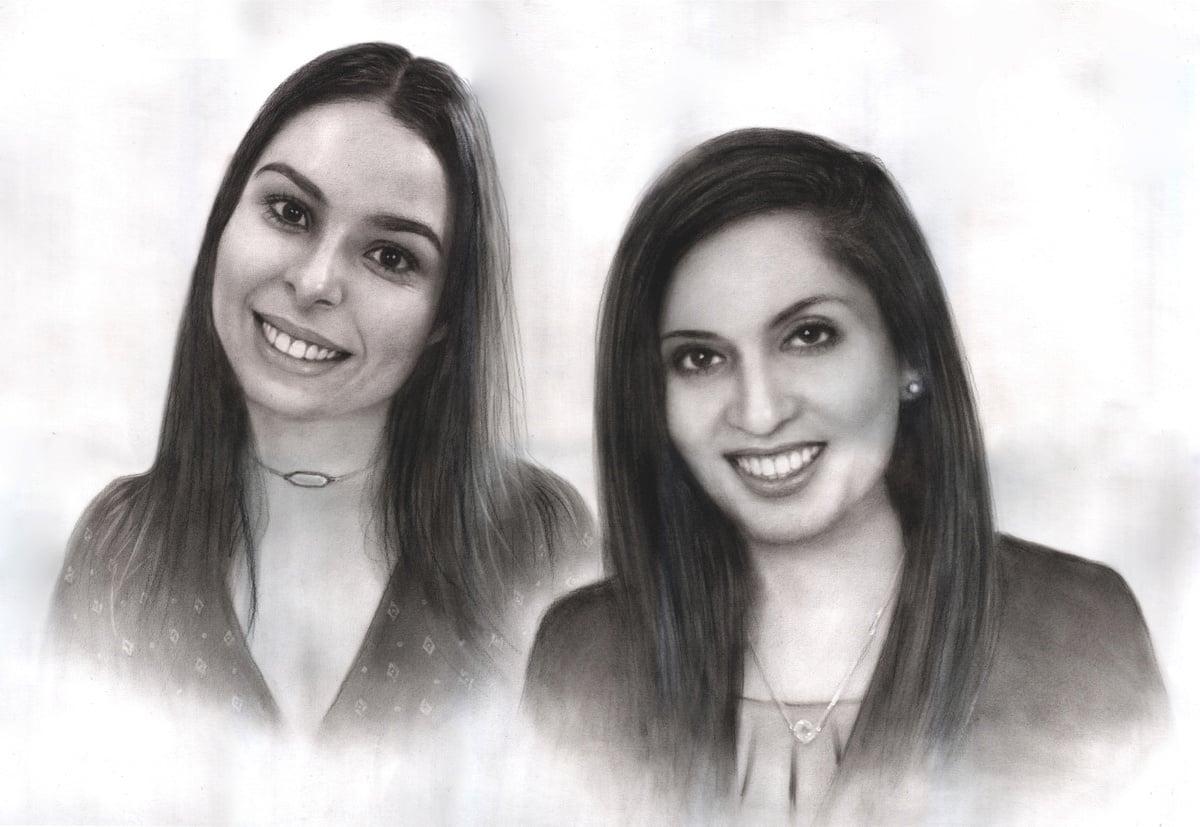 Two women are smiling in front of a white background in a premium charcoal dark style.